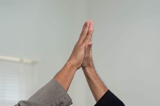 A close-up view of a handshake between two professionals, illustrating the essence of trust and collaboration in business.
