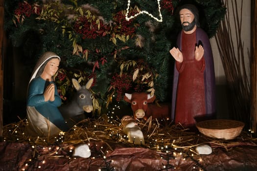 Christmas creche with Joseph Mary and small Jesus