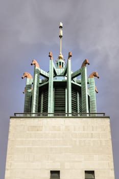 Newcastle, UK - Apr 14, 2025 - Stunning exterior view of The carillon or Bell tower with 12 large and 8 small seahorses at The Newcastle Civic Centre of Newcastle Upon Tyne. use it as your Wallpaper, Poster and Space for text, Selective focus.
