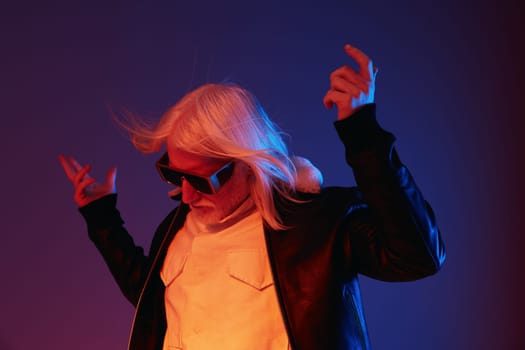 This image features a fashionable elderly man with long white hair and sunglasses, styled in a leather jacket The vibrant purple and blue background enhances the contemporary feel, emphasizing individuality and self expression