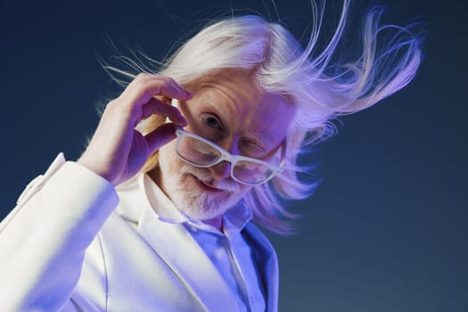 A captivating portrait featuring an elderly man with long white hair and glasses, styled in a white suit The dark gradient background enhances the contemporary and chic feel of the image, perfect for marketing and creative projects