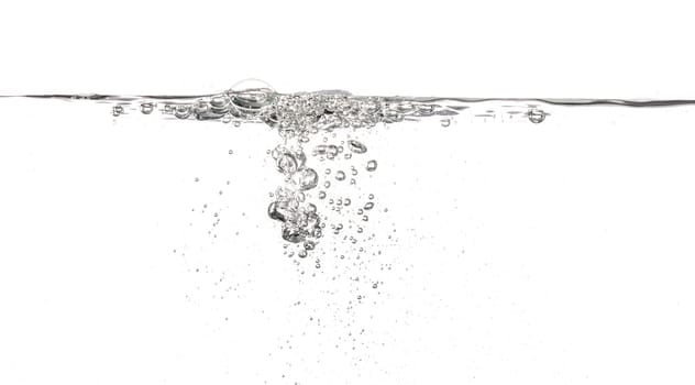 Water poured into tank, bubbles and splashes visible on white background