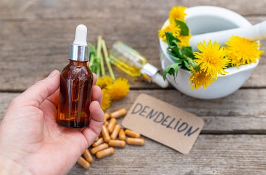 Dandelion extract and homeopathic supplements. Selective focus. nature.