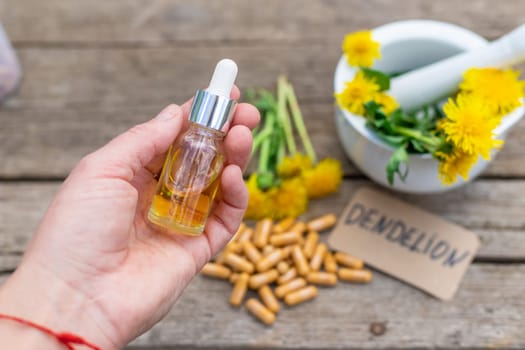 Dandelion extract and homeopathic supplements. Selective focus. nature.