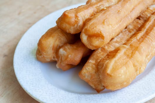 Close up view of delicious cakoi or youtiao cake. Asian food concept.