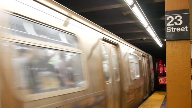 New York City, United States - 30 Aug 2023: Subway station interior, underground metropolitan platform sign. Metro railway passenger public transport. Text signboard: 23 Street. Midtown Manhattan, NYC