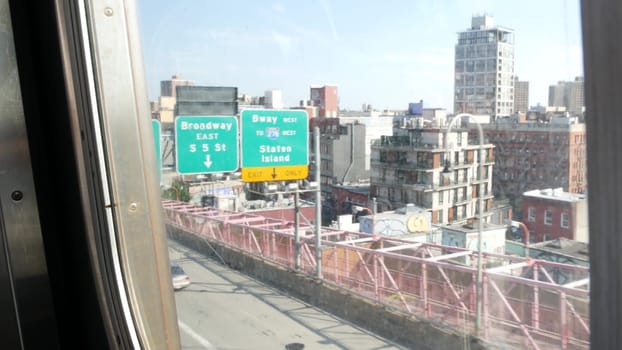 New York City, United States - 7 Sept 2023: Subway train, Williamsburg bridge. Shaking camera, dirty window. Manhattan metro transport, metropolitan traffic. Passenger railway. Broadway, Bronx, Queens