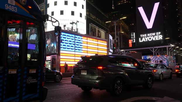 New York City, United States - 14 Sept 2023: Ambulance medical emergency, american paramedic truck. USA 911 vehicle on street, Manhattan Times Square. NYC first responders car. Military island flag.