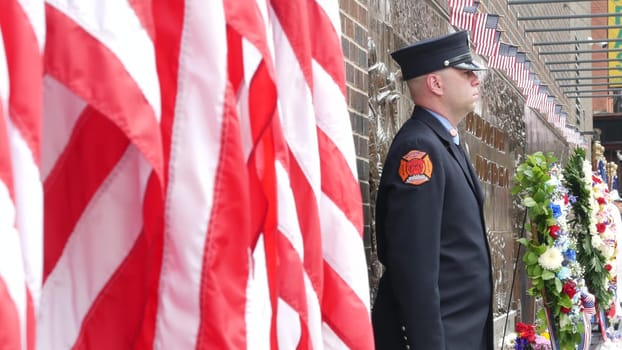 New York City, United States - 11 September 2023: Firefighters celebrate Patriot Day. Guard honoring 911, Memorial wall, FDNY commemorate anniversary. Fire Depart Station, Manhattan 10 Ten Firehouse.