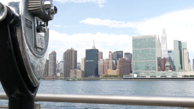 New York City, United States - 4 Sept 2023: Waterfront skyline, Manhattan Midtown, United Nations UN building riverfront skyscraper. Waterside cityscape, tower viewer, Long Island Gantry Plaza, Queens