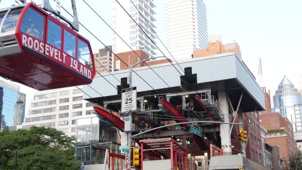 New York City, United States - 15 Sept 2023: Roosevelt Island tramway to Manhattan Midtown. American aerial cable tram near Queensboro Bridge. Urban public transportation, passenger transport in USA.