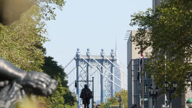 New York City, United States - 3 Sept 2023: Manhattan Bridge to Dumbo, Brooklyn Downtown Columbus autumn park near Borough Hall. USA tourist landmark. Tree leaves, flowers. Henry Ward Beecher Statue.