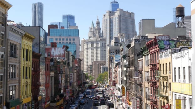 New York City, United States - 14 Sept 2023: Manhattan Chinatown East Broadway street, chinese ethnic district architecture, little Fuzhou, USA. World trade Center tower in Downtown. Manhattan Bridge.