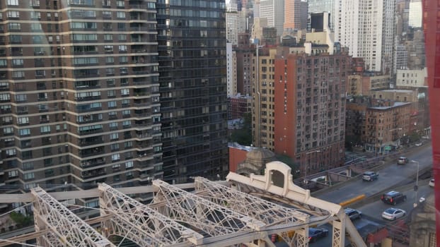 New York City, United States - 15 Sept 2023: Roosevelt Island tramway to Manhattan Midtown streets. American cable tram, Queensboro Bridge. Urban public transport, USA. Building architecture cityscape