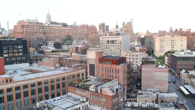 New York City, United States, 2 Sept 2023: Manhattan skyline cityscape. Empire State building. Rooftop, residential district roof. Real Estate architecture. Midtown Chelsea. Google headquarters office