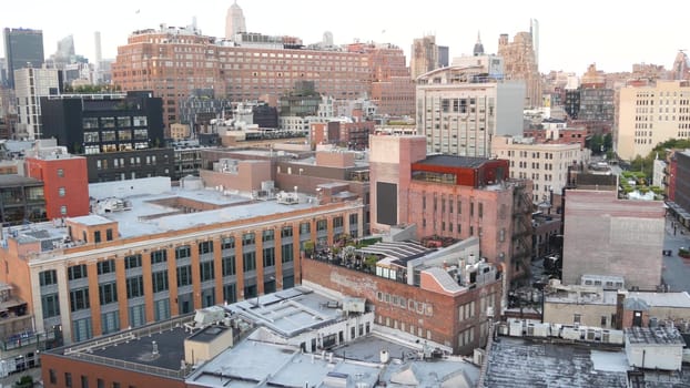 New York City, United States, 2 Sept 2023: Manhattan skyline cityscape. Empire State building. Rooftop, residential district roof. Real Estate architecture. Midtown Chelsea. Google headquarters office