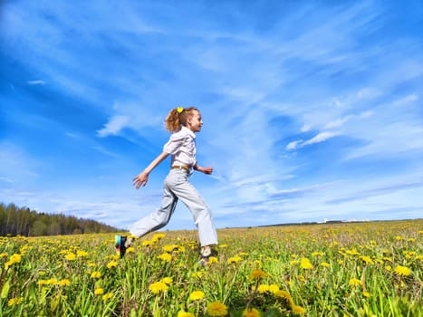 A young girl is running playfully across a bright field filled with dandelions, enjoying the warmth of a sunny spring day.
