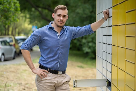 A stylish young man stands confidently by a contemporary building, wearing a vibrant shirt that pops with color