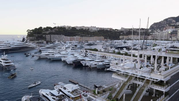 Port hercule in monaco hosts an exhibition of luxury yachts and boats