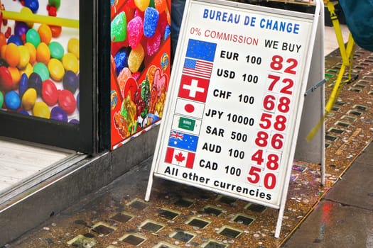 London, United Kingdom - February 01, 2019: Currency exchange rates table in front of Bureau the change office at central London. These are usually situated in popular tourist spots