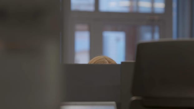 A serene and calming glimpse into a beautifully arranged office showcasing a partial object with soft lighting. Stock Footage