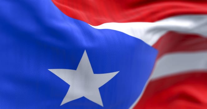 Close-up of the Puerto Rican flag with white star and red, white, and blue stripes, symbolizing national pride, identity, and heritage. Realistic 3D render of fabric texture.