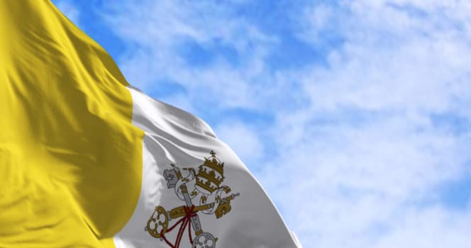 Close-up of the Vatican City flag with crossed keys and papal tiara, fluttering in the wind against a clear blue sky, symbolizing faith, identity, and freedom. 3D render.