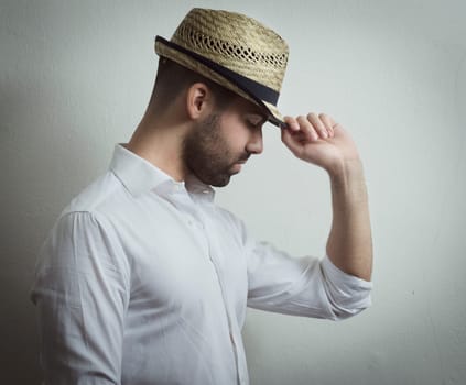 Young attractive man with modern hat