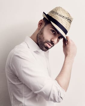 Young attractive man with modern hat