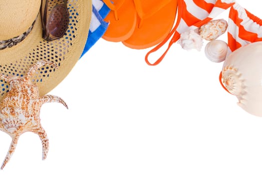 pair of orange sandals seashells frame isolated on white background