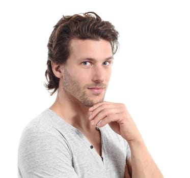 Sexy man looking at camera with the hand on the chin isolated on a white background