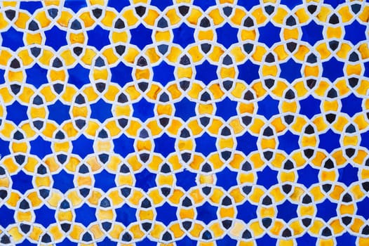 yellow and blue ceramic tiles with an abstract geometric pattern. Background with ornament