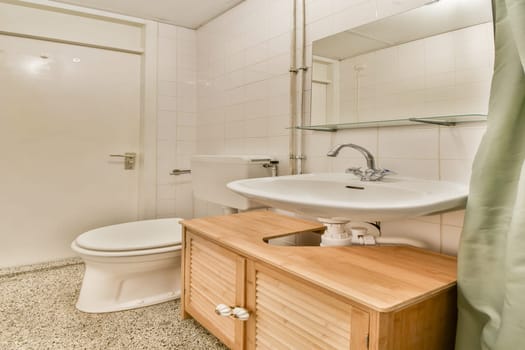 This image showcases a modern bathroom featuring a sleek design, with clean lines and minimal decor, emphasizing functionality and space efficiency.