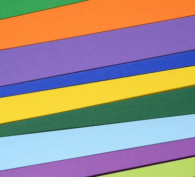 Colorful diagonal paper stripes, close up