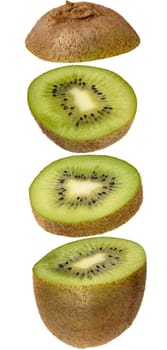 Ripe kiwi fruit cut into pieces on isolated background