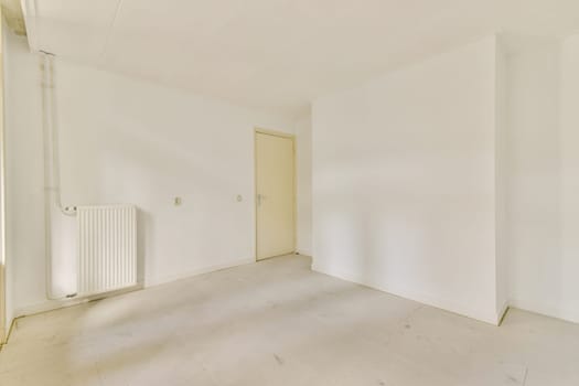 A minimalistic and clean white interior showcasing an empty room with plain walls and flooring, emphasizing simplicity and spaciousness.