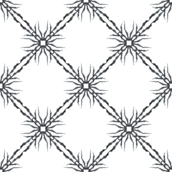 Ikat repeating swimwear design. Black and white appealing boho chic summer design. Watercolor ikat repeating tile border. Textile ready trending print, swimwear fabric, wallpaper, wrapping.