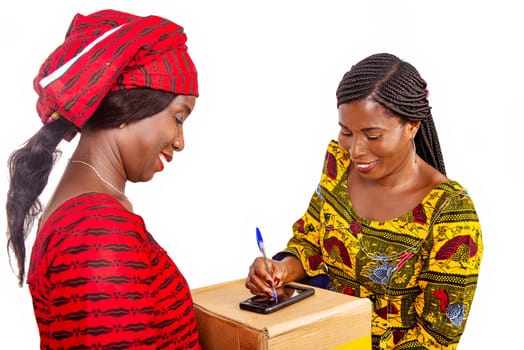 adult delivery service woman in red loincloth and female adult client applying digital mobile phone signature receiving mail box at office