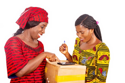adult delivery service woman in red loincloth and female adult client applying digital mobile phone signature receiving mail box at office
