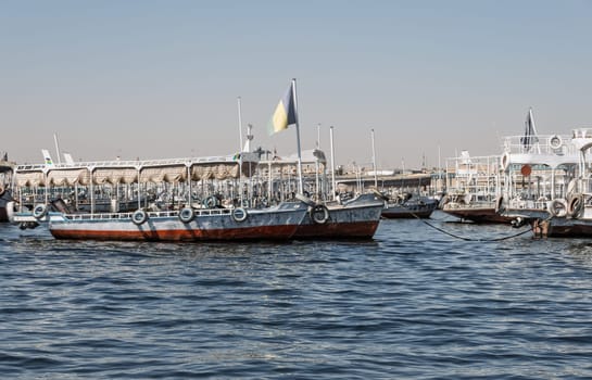 Many docked tour boats and ferries by the Old Aswan dam used to transport tourists to Philae Temple