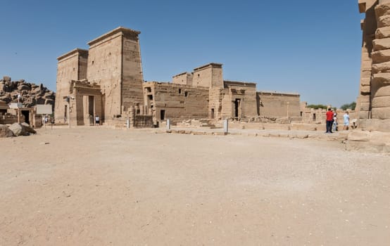 Side view of the reconstructed Philae Temple on an island in Aswan Harbor or Reservoir formed by the Low Dam on the Nile