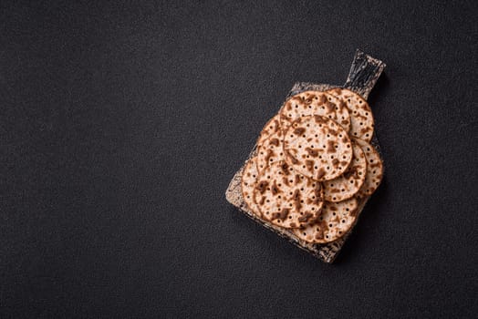 Matzah wheat bread for the Jewish holiday of passover. Kosher thin wheat matzo bread