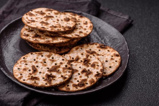 Matzah wheat bread for the Jewish holiday of passover. Kosher thin wheat matzo bread