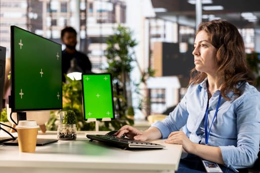 Female advisor conducting financial planning and goal setting with a mockup, demonstrating expertise in budget management. CEO analyzing online reports and forecasts for company growth.