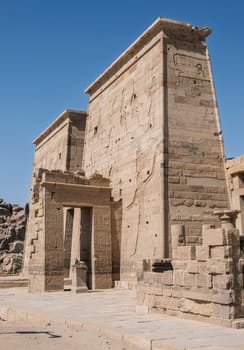 Entrance to the reconstructed Philae Temple on an island in Aswan Harbor or Reservoir formed by the Low Dam on the Nile