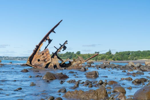 Shipwrecked remains of bow of Gairloch on south end Oakura beach New Plymouth.