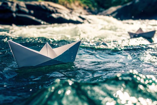 Small paper boats glide on the surface of a flowing river surrounded by rocks and greenery, illuminated by the afternoon sun. Generative AI.