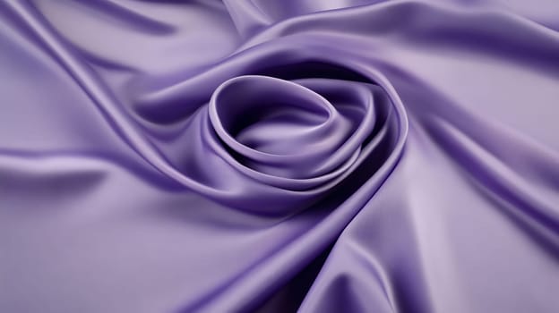 Flowing purple silk fabric in spiral pattern with smooth texture.