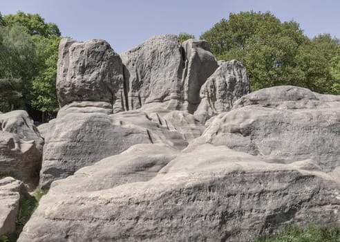 Scenery view of An unusual outcrop of natural sandstone rocks on Wellington Rocks at Tunbridge Wells Common. use it as your Wallpaper, Poster and Space for text, Selective focus.