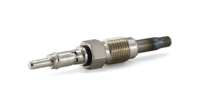 Detailed view of a metal glow plug used in diesel engines, presented on a plain studio background.